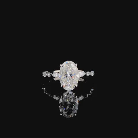 Emerald Elegance Oval Shaped Diamond Ring